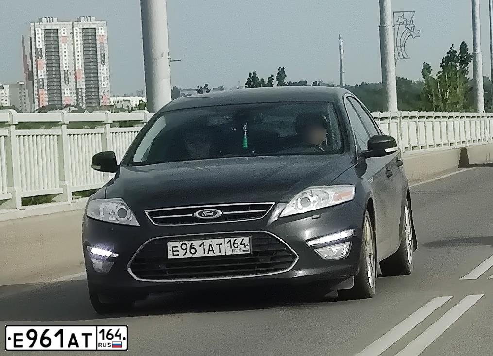 Фото автомобиля FORD MONDEO, 2013 — госномер Н298ТУ70. Цвет: ЧЕРНЫЙ