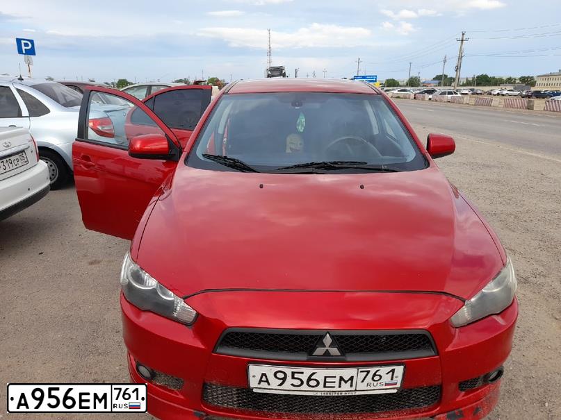 Фото автомобиля MITSUBISHI LANCER, 2008 — госномер А956ЕМ761. Цвет: Красный