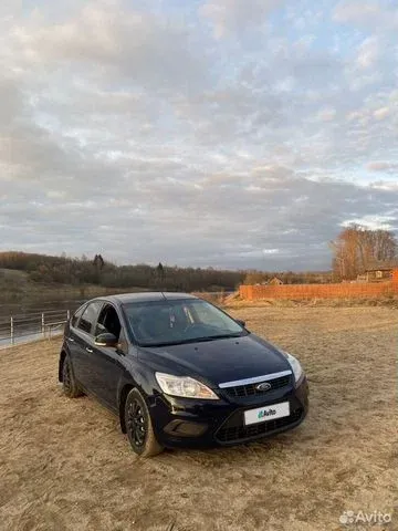 Фото автомобиля FORD FOCUS, 2010 — госномер К391УО35. Цвет: Темно-синий