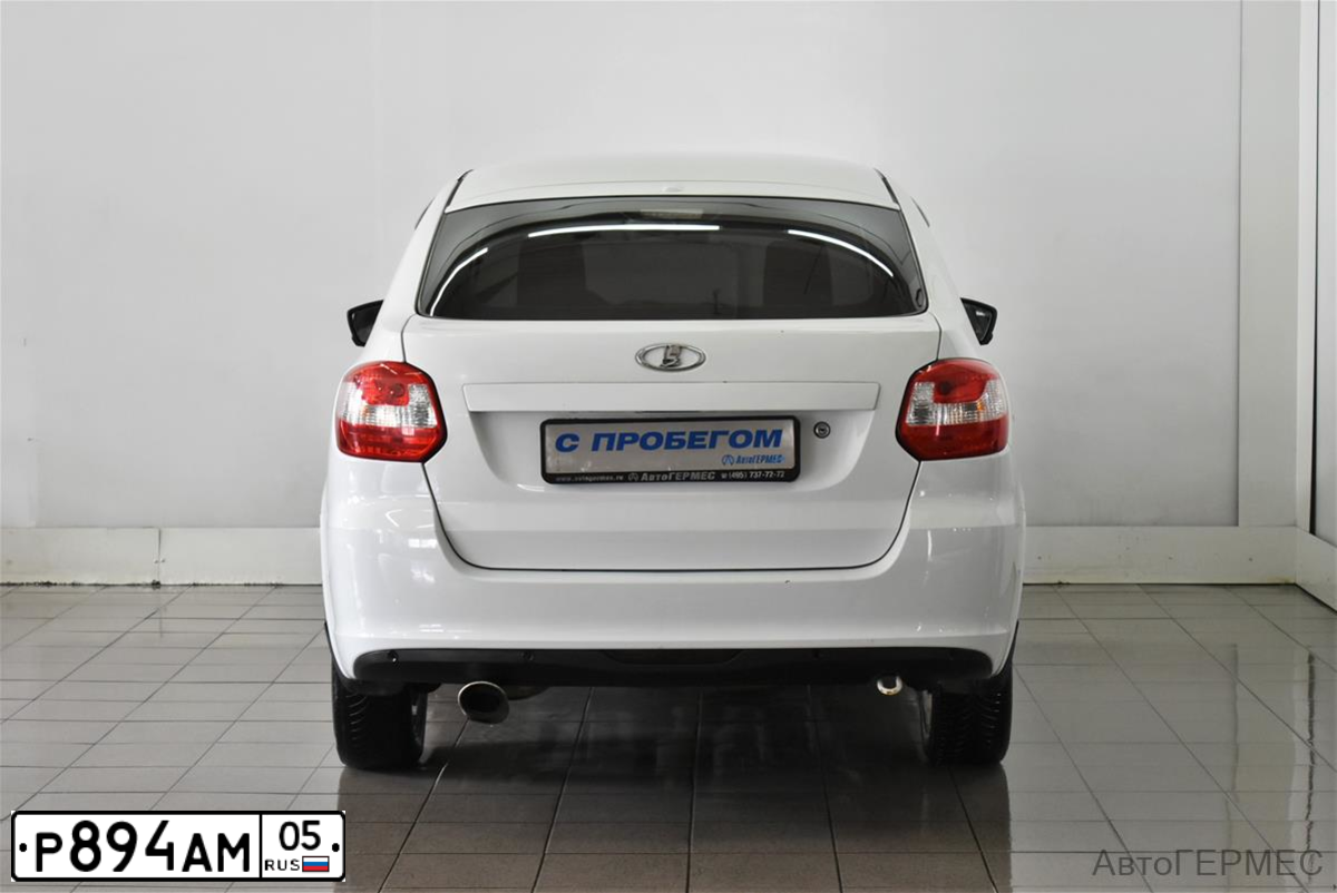 Фото автомобиля LADA GRANTA, 2015 — госномер В309КТ06. Цвет: Белый