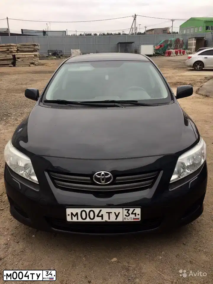Фото автомобиля TOYOTA COROLLA, 2008 — госномер М004ТУ34. Цвет: ЧЕРНЫЙ