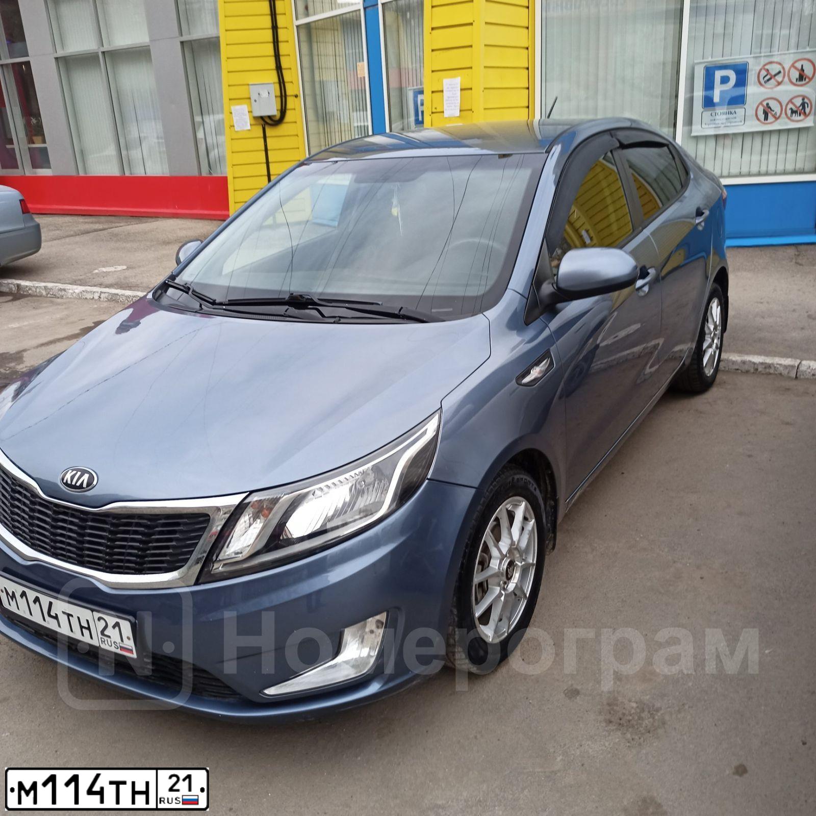 Фото автомобиля KIA RIO, 2013 — госномер М114ТН21. Цвет: голубой