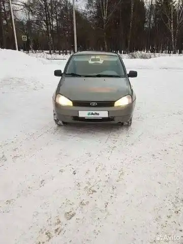 Фото автомобиля LADA 1117 KALINA, 2010 — госномер В372СУ43. Цвет: Темно-серый металлик