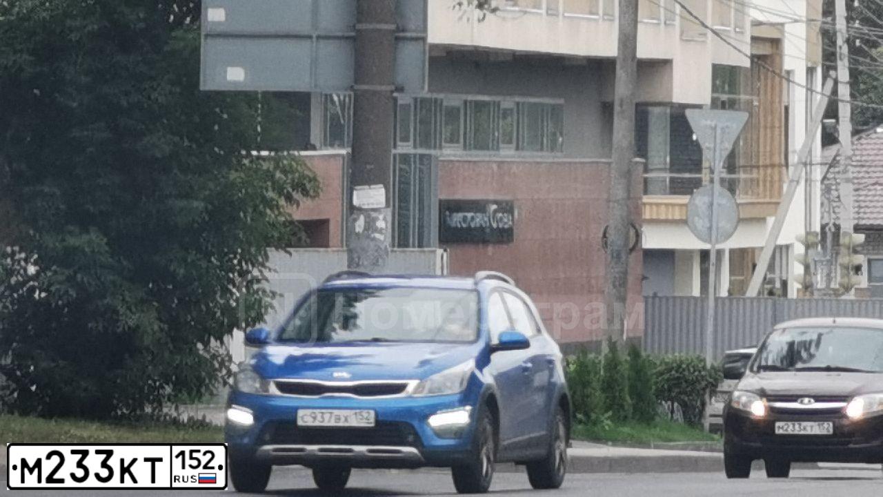 Фото автомобиля LADA 2190 GRANTA, 2013 — госномер М233КТ152. Цвет: ТЕМНО-ВИШНЕВЫЙ