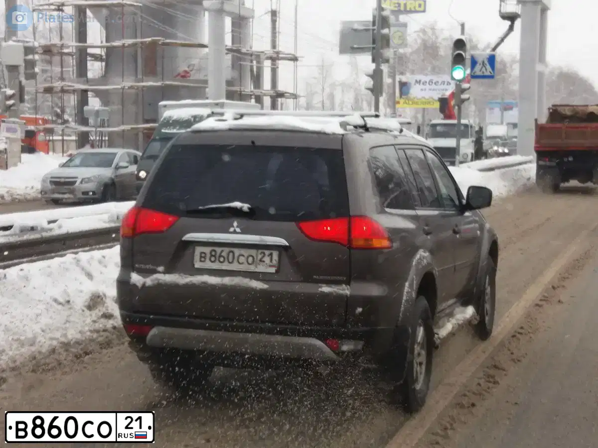 Фото автомобиля MITSUBISHI PAJERO SPORT, 2012 — госномер В860СО21. Цвет: КОРИЧНЕВЫЙ