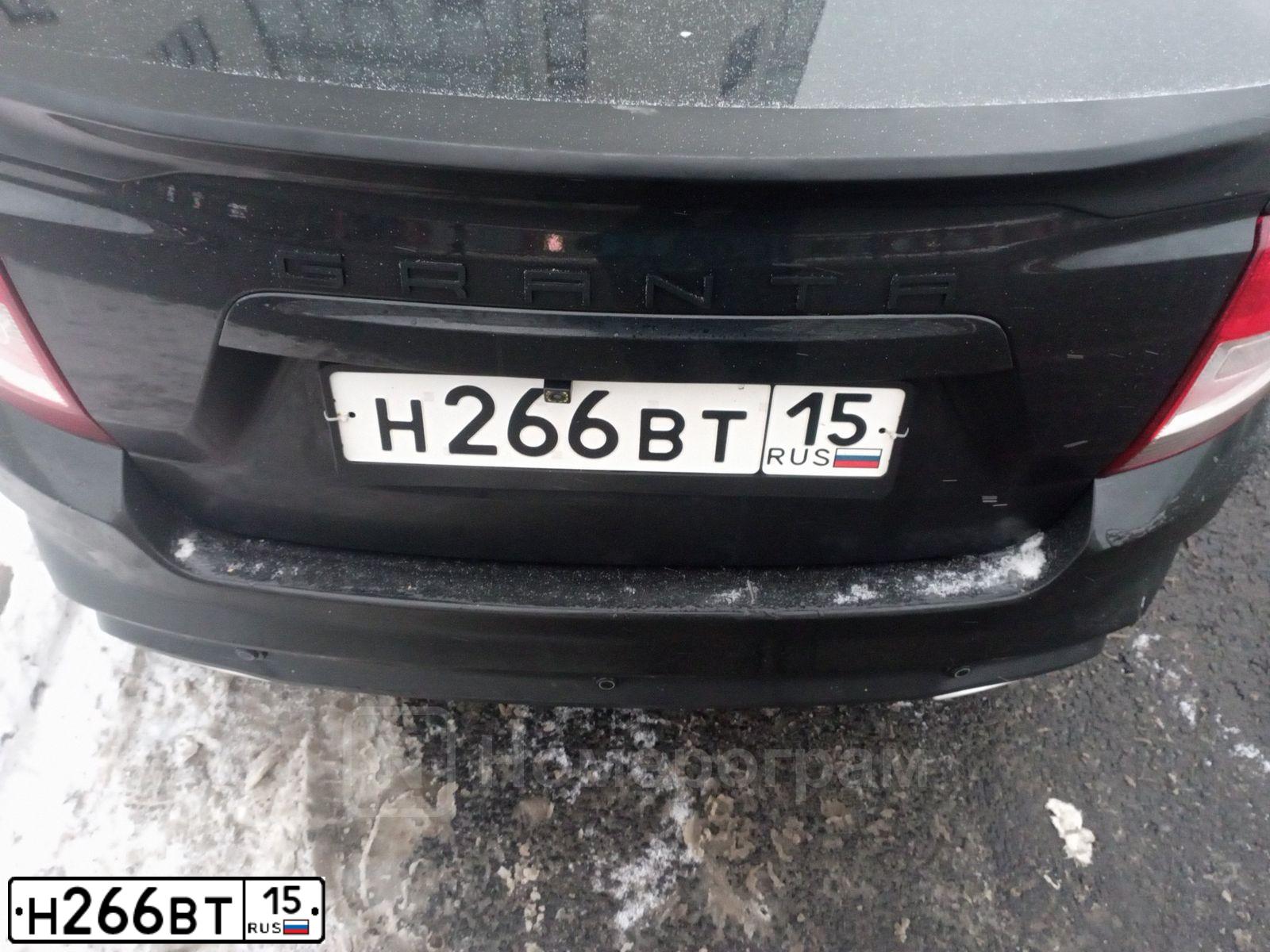 Фото автомобиля LADA 2190 GRANTA, 2020 — госномер Н266ВТ15. Цвет: ЧЕРНЫЙ