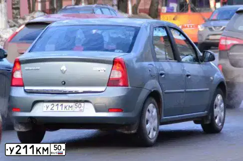 Фото автомобиля LADA 2105, 1996 — госномер У211КМ50. Цвет: БАКЛАЖАННЫЙ