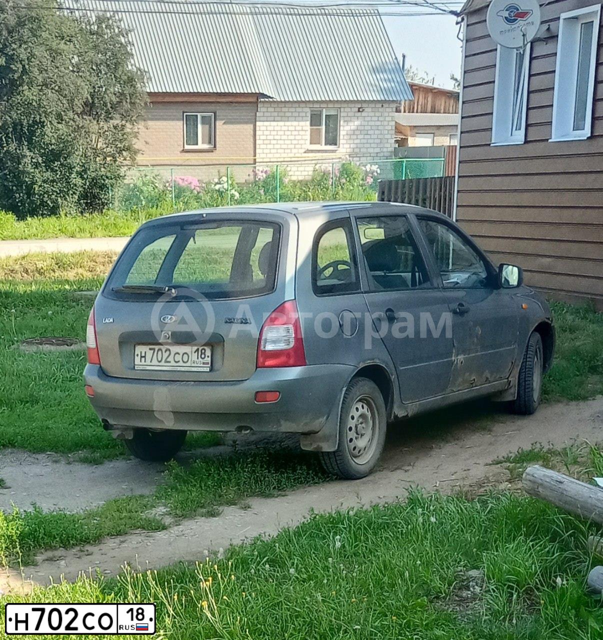 Фото автомобиля LADA 1117 KALINA, 2009 — госномер Н702СО18. Цвет: ТЕМНО-СЕРЫЙ МЕТАЛЛИК