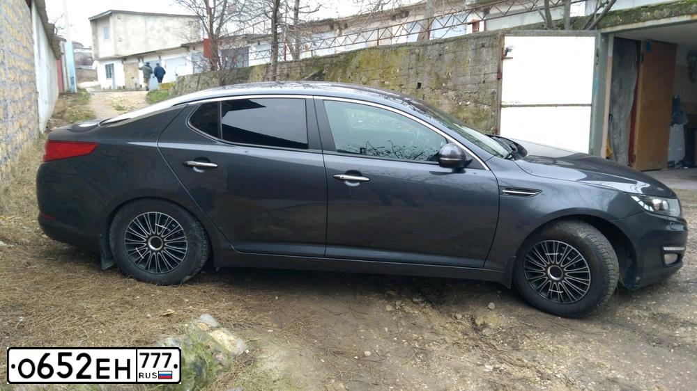 Фото автомобиля KIA OPTIMA, 2012 — госномер Н025МЕ82. Цвет: Серый