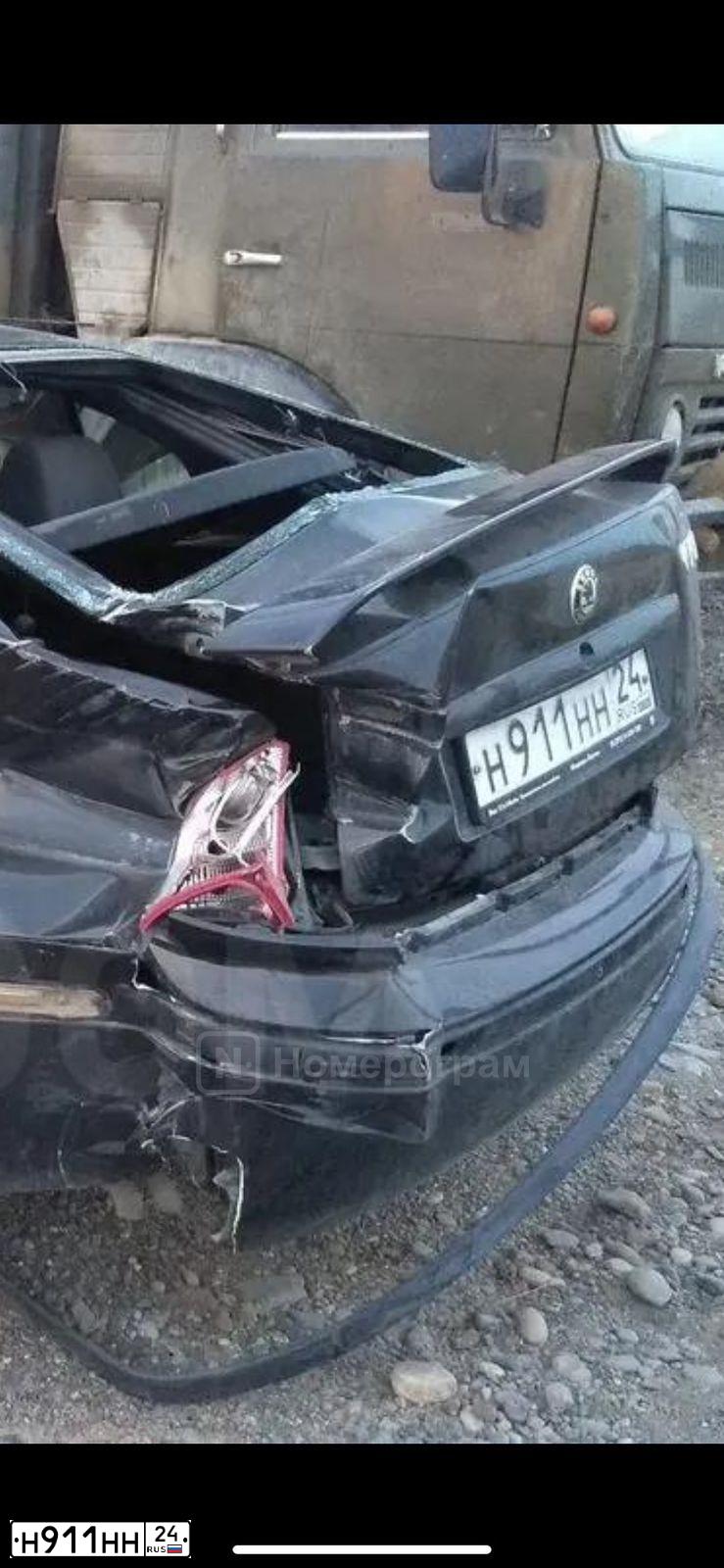Фото автомобиля LADA 2107, 2004 — госномер Н911НН24. Цвет: БЕЛЫЙ