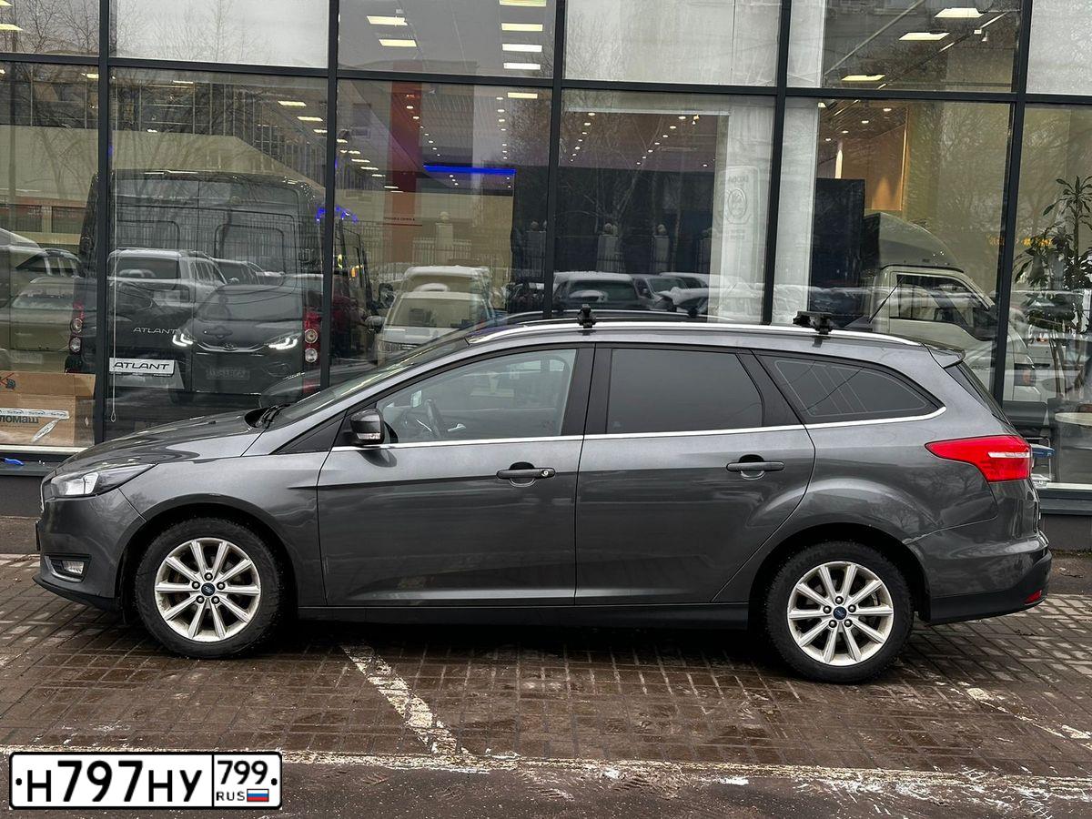 Фото автомобиля FORD FOCUS, 2019 — госномер Н797НУ799. Цвет: Серый