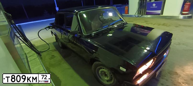 Фото автомобиля LADA 2107 LADA, 2010 — госномер Х176КТ72. Цвет: Сине-Черный