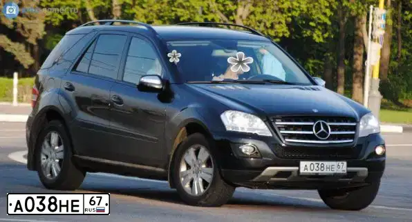Фото автомобиля MERCEDES M-KLASSE, 2009 — госномер В544ХТ777. Цвет: КРАСНЫЙ ЧЕРНЫЙ