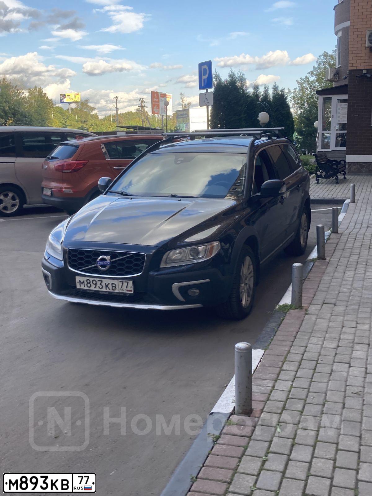 Фото автомобиля VOLKSWAGEN TIGUAN, 2012 — госномер С062УН77. Цвет: ЧЕРНЫЙ