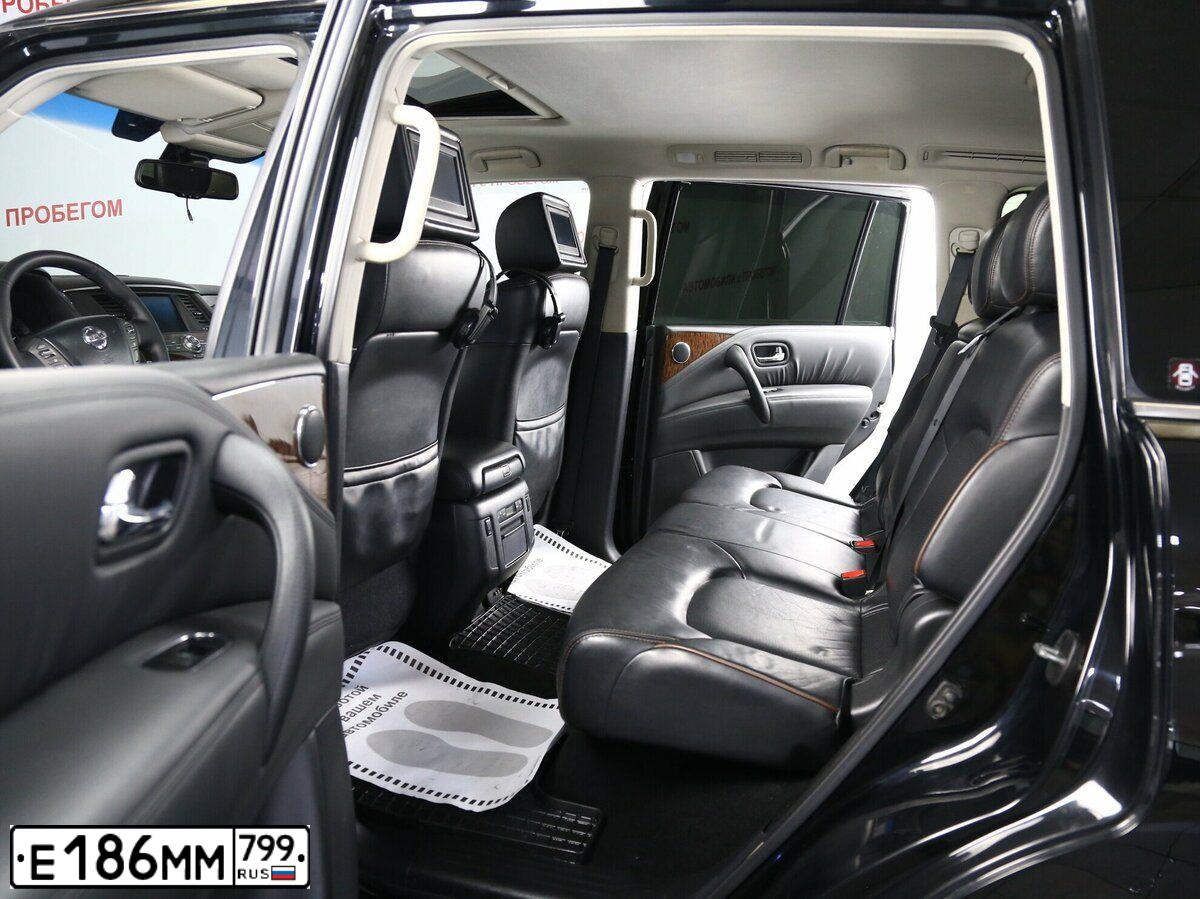 Фото автомобиля NISSAN PATROL, 2011 — госномер Е186ММ799. Цвет: ЧЕРНЫЙ