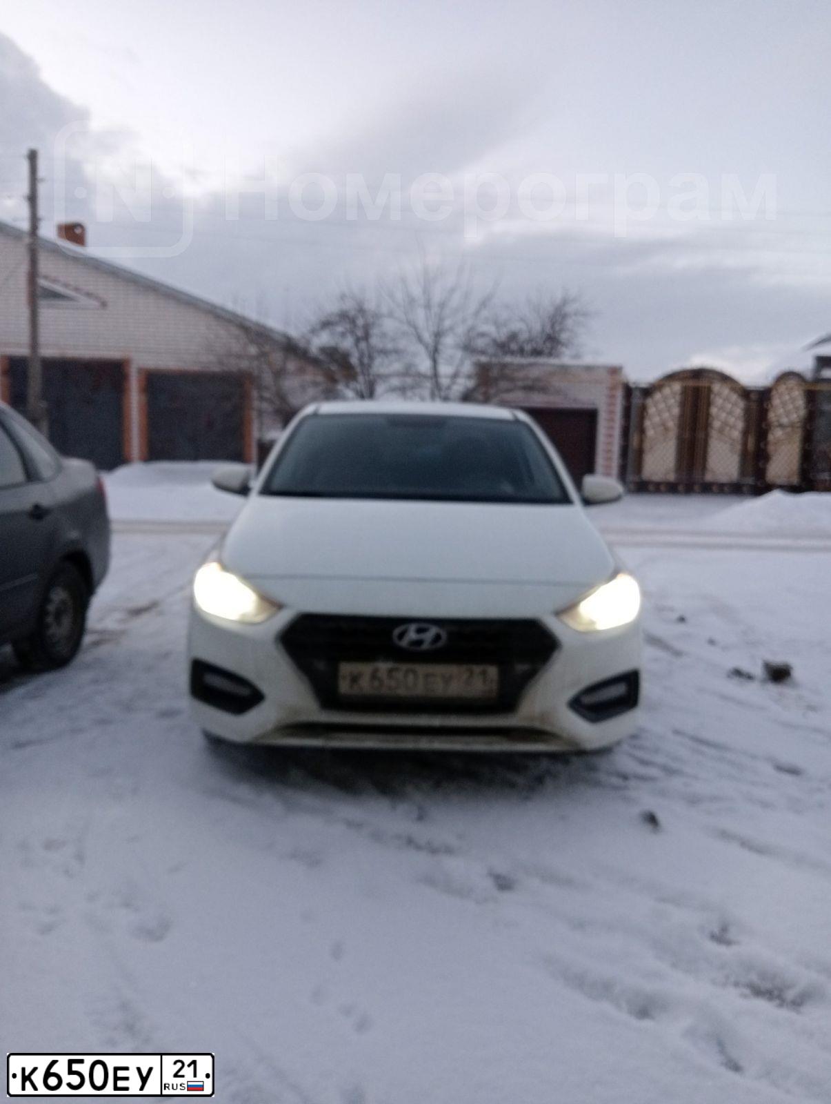 Фото автомобиля HYUNDAI SOLARIS, 2019 — госномер К650ЕУ21. Цвет: БЕЛЫЙ