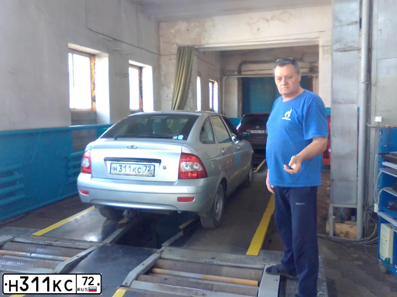 Фото автомобиля LADA 2172 PRIORA, 2011 — госномер Н311КС72. Цвет: СЕТЛО-СЕРЕБРИСТЫЙ МЕТАЛЛ