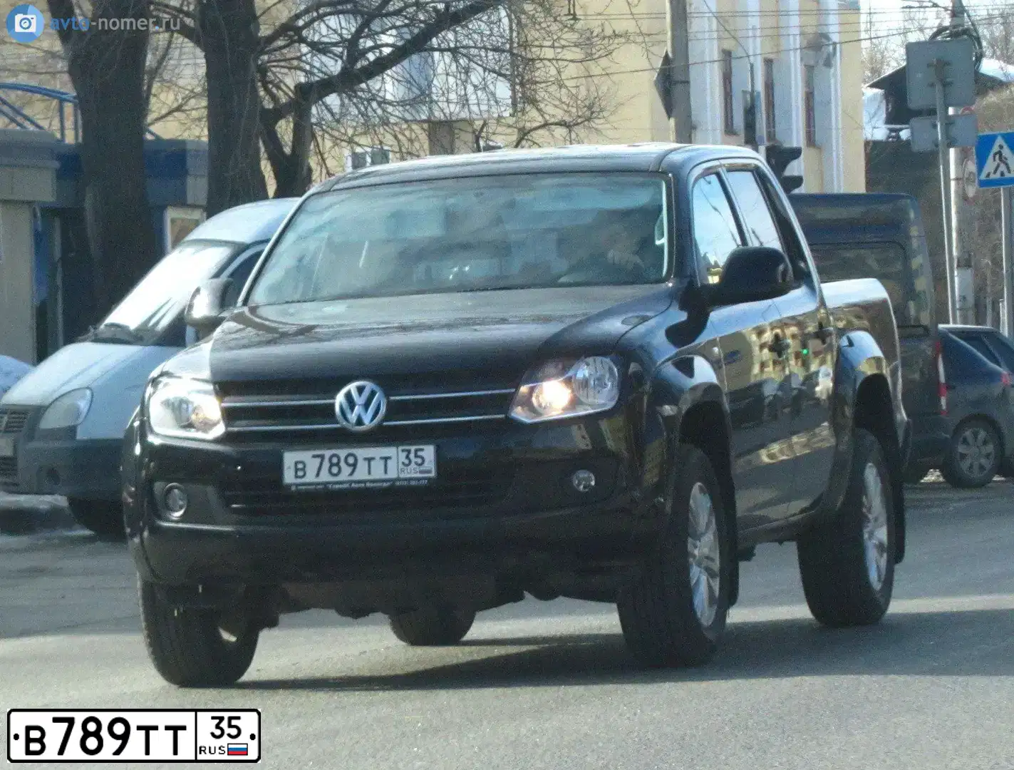 Фото автомобиля VOLKSWAGEN AMAROK, 2011 — госномер В789ТТ35. Цвет: ЧЕРНЫЙ