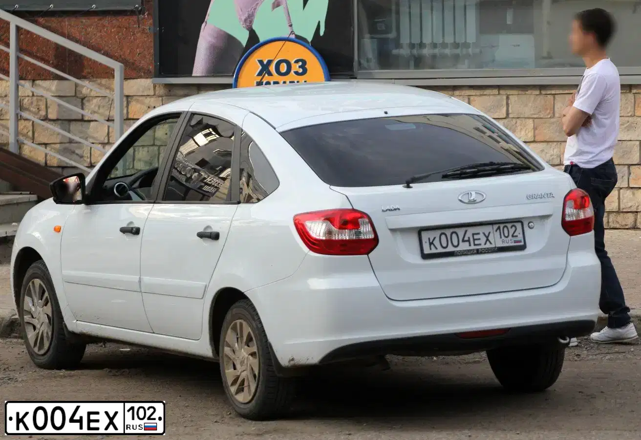 Фото автомобиля LADA 2191 GRANTA, 2015 — госномер К004ЕХ102. Цвет: Белый