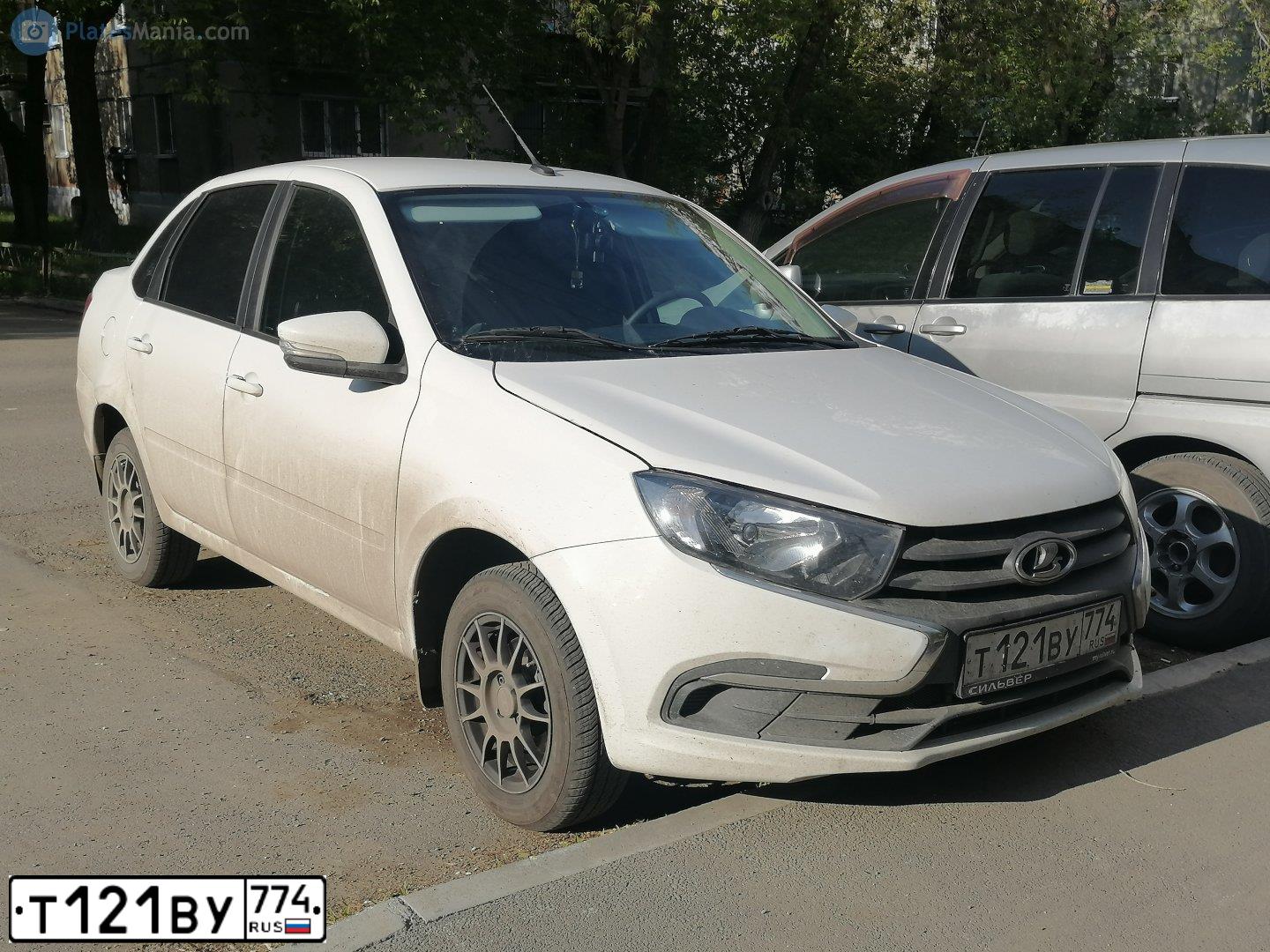 Фото автомобиля LADA GRANTA 219040, 2023 — госномер Т121ВУ774. Цвет: Белый