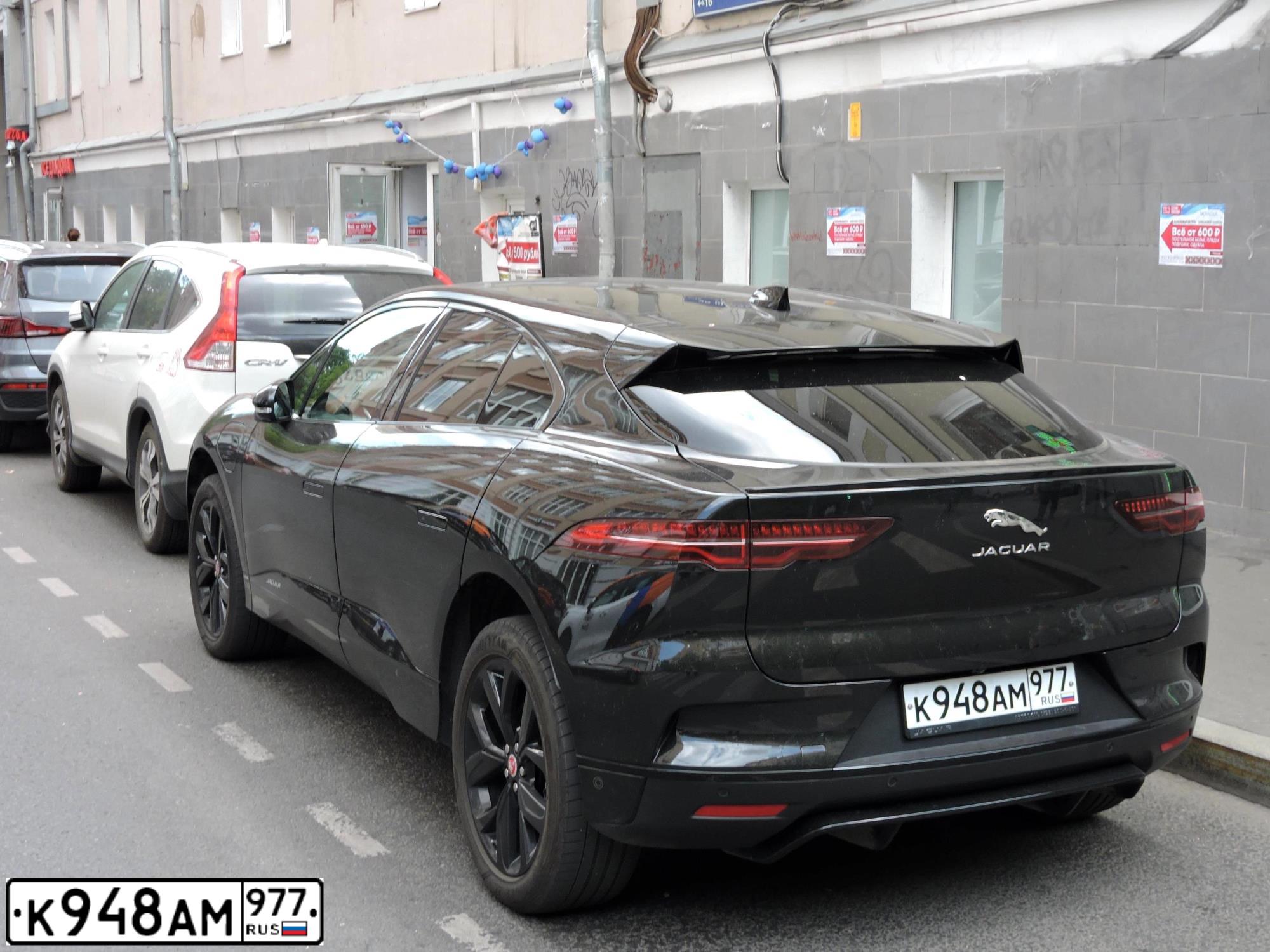Фото автомобиля JAGUAR I-PACE, 2020 — госномер К948АМ977. Цвет: ЧЕРНЫЙ