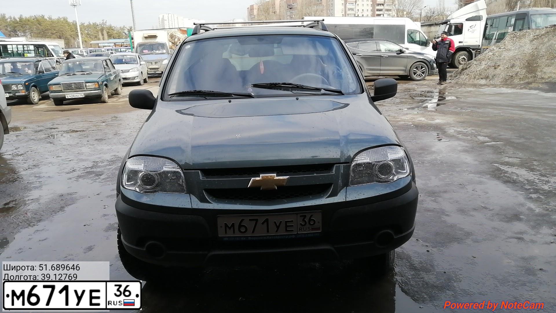 Фото автомобиля CHEVROLET NIVA, 2012 — госномер М671УЕ36. Цвет: темный серо-зеленый металлик
