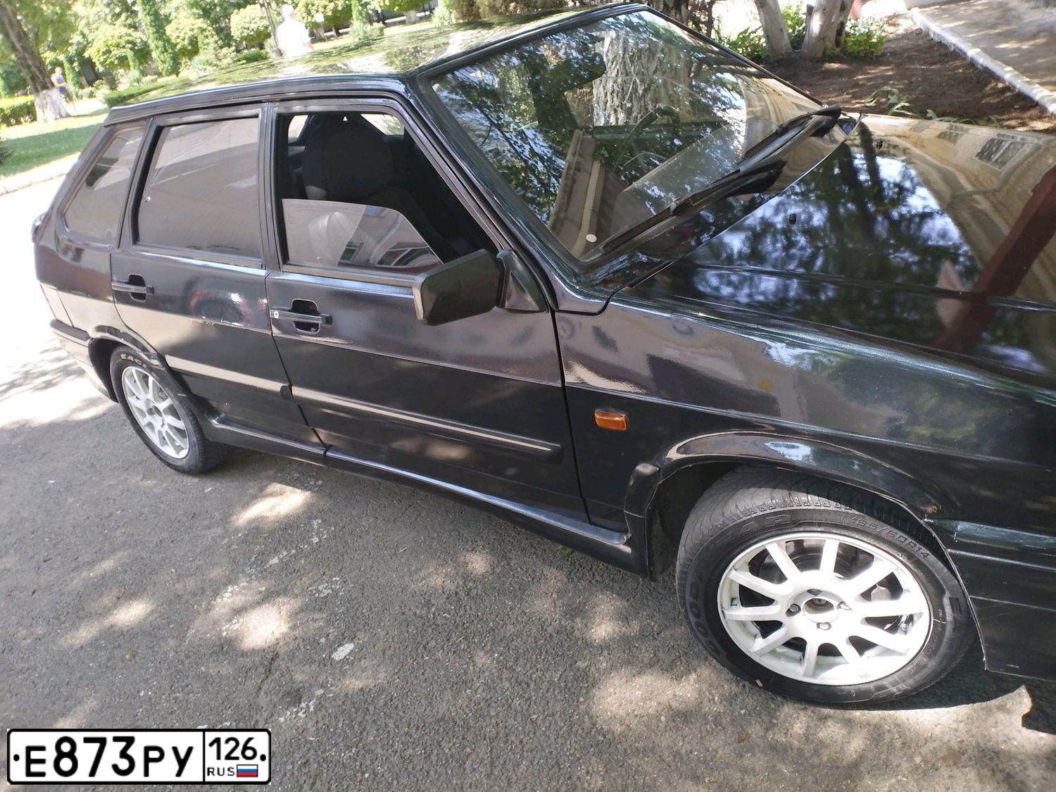 Фото автомобиля LADA 2114 SAMARA, 2011 — госномер Е873РУ126. Цвет: СИНЕ-ЧЕРНЫЙ