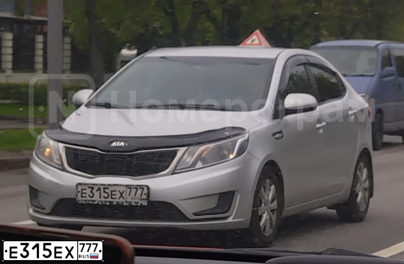 Фото автомобиля KIA RIO, 2014 — госномер Е315ЕХ777. Цвет: СЕРЫЙ