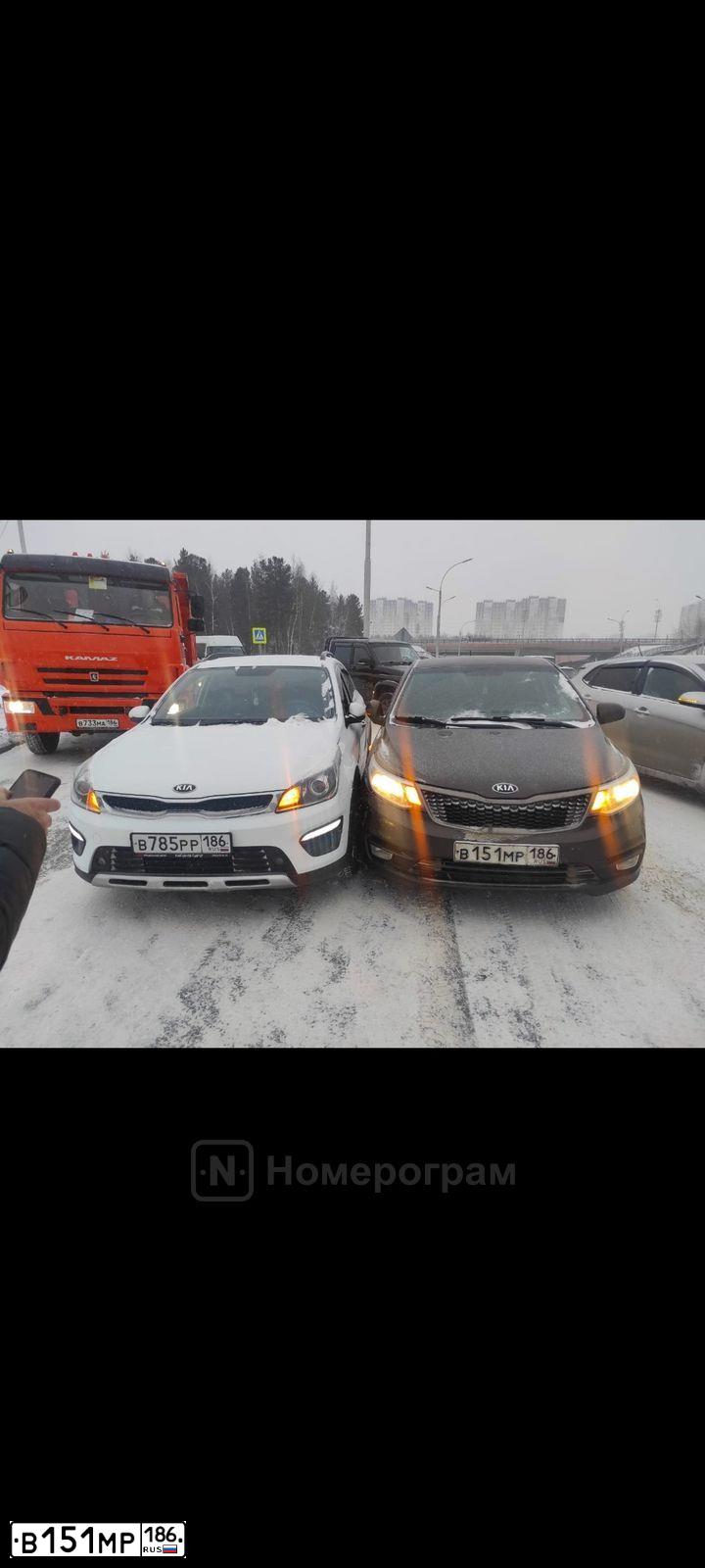 Фото автомобиля KIA RIO, 2016 — госномер В151МР186. Цвет: КОРИЧНЕВЫЙ