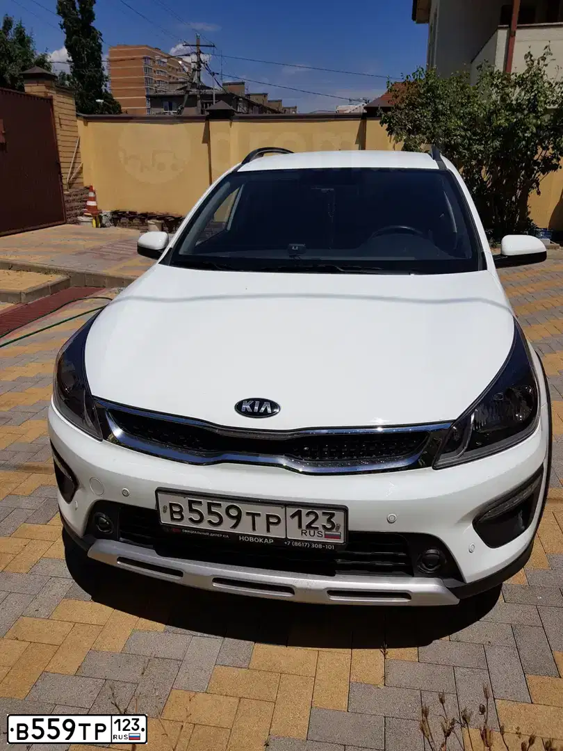 Фото автомобиля KIA RIO, 2017 — госномер В204ХР123. Цвет: БЕЛЫЙ