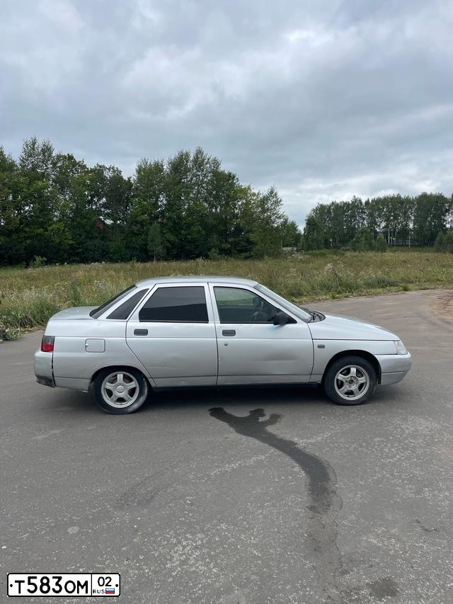 Фото автомобиля LADA 2110, 2004 — госномер Н212УА702. Цвет: СВЕТЛО-СЕРЕБРИСТЫЙ МЕТАЛЛ