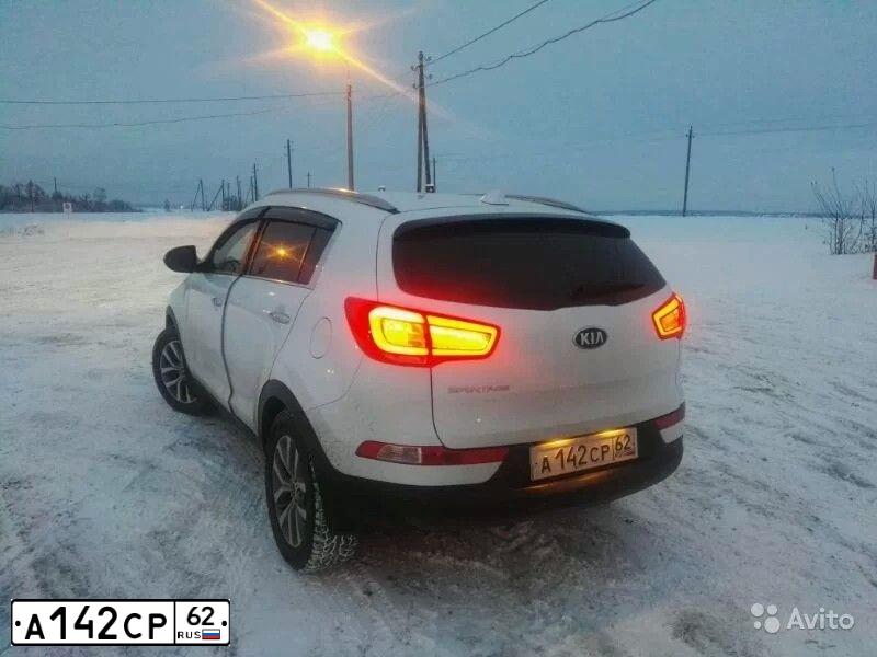 Фото автомобиля KIA SPORTAGE, 2014 — госномер А142СР62. Цвет: Белый