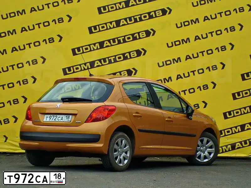 Фото автомобиля PEUGEOT 207, 2008 — госномер Е252АЕ126. Цвет: ОРАНЖЕВЫЙ