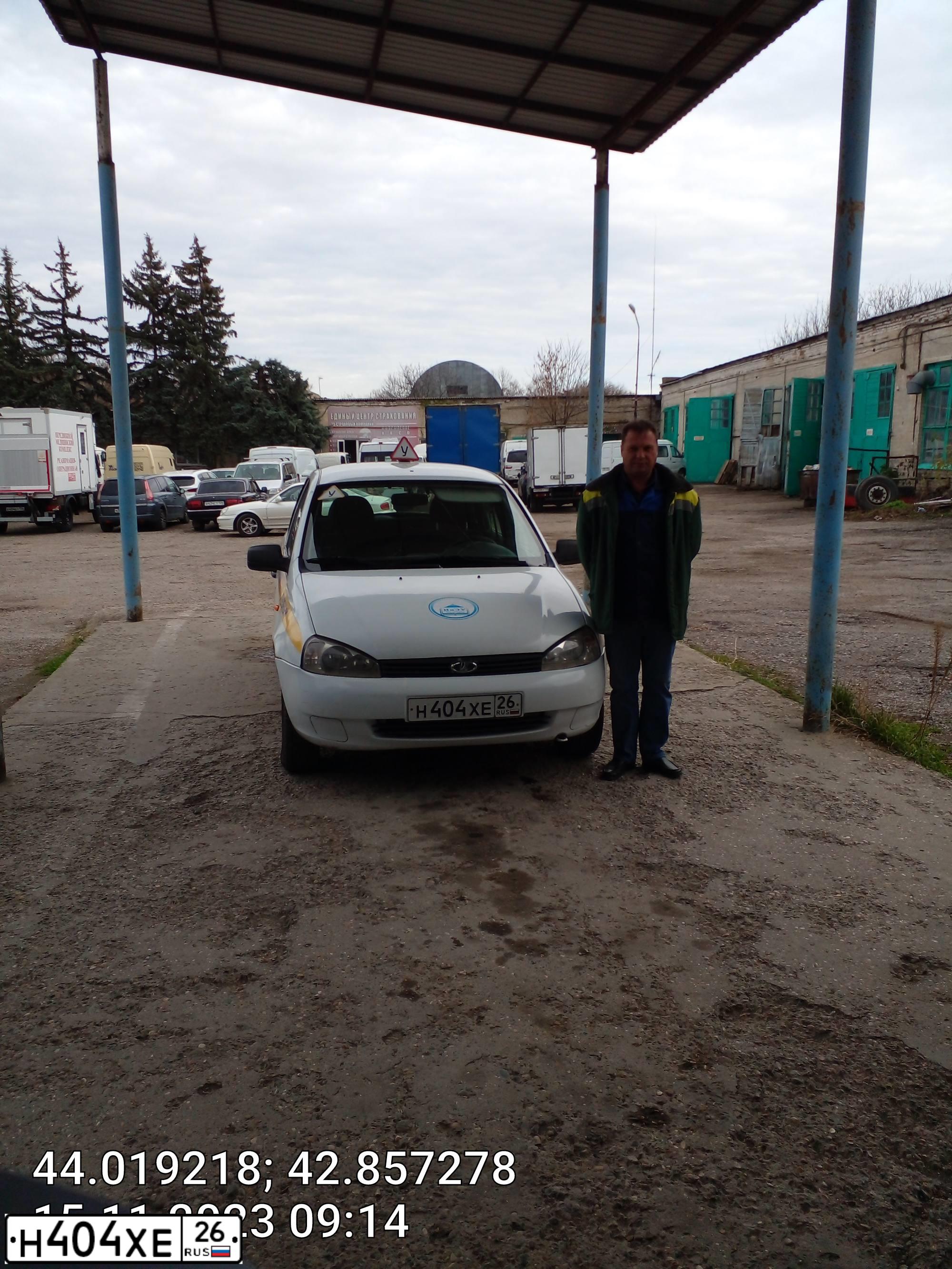 Фото автомобиля LADA 1119 KALINA, 2013 — госномер Н404ХЕ26. Цвет: БЕЛЫЙ