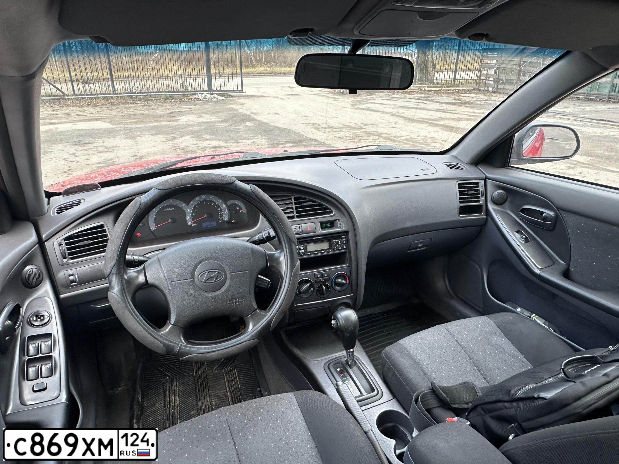 Фото автомобиля HYUNDAI ELANTRA, 2002 — госномер С869ХМ124. Цвет: Красный