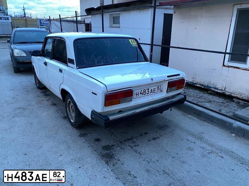 Фото автомобиля LADA 2107, 2001 — госномер Е154ХО82. Цвет: ЯРКО-БЕЛЫЙ