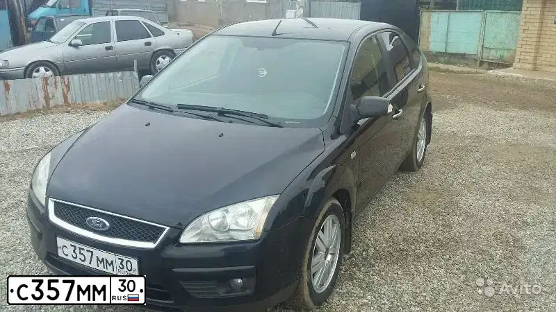 Фото автомобиля FORD FOCUS, 2007 — госномер Р172УМ123. Цвет: ЧЕРНЫЙ