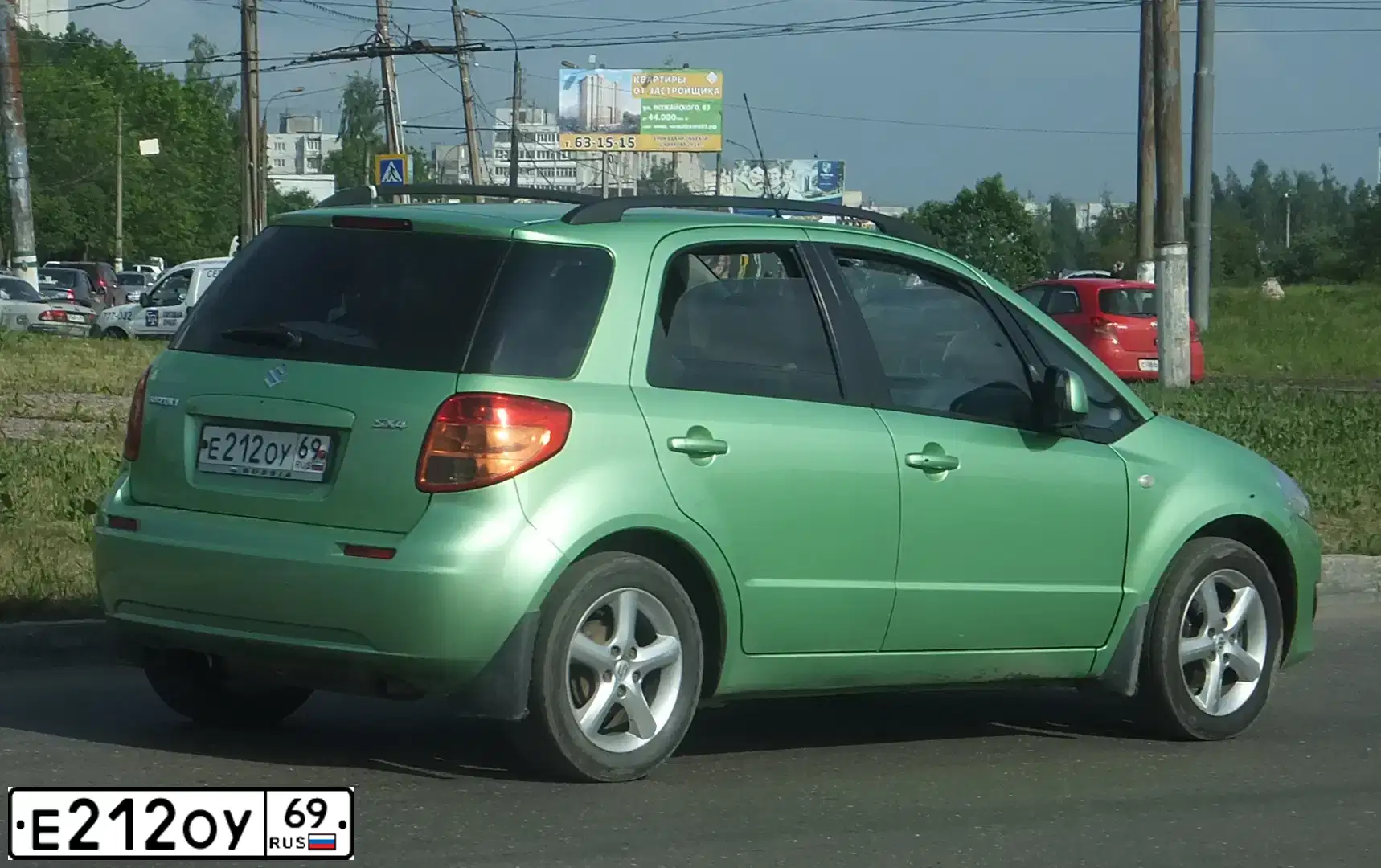 Фото автомобиля SUZUKI SX 4, 2008 — госномер Е212ОУ69. Цвет: ЗЕЛЕНЫЙ