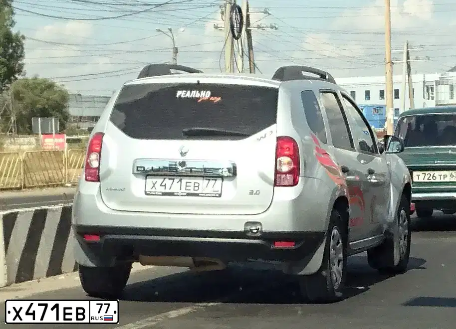 Фото автомобиля RENAULT DUSTER, 2012 — госномер А104УР763. Цвет: СВЕТЛО-СЕРЫЙ