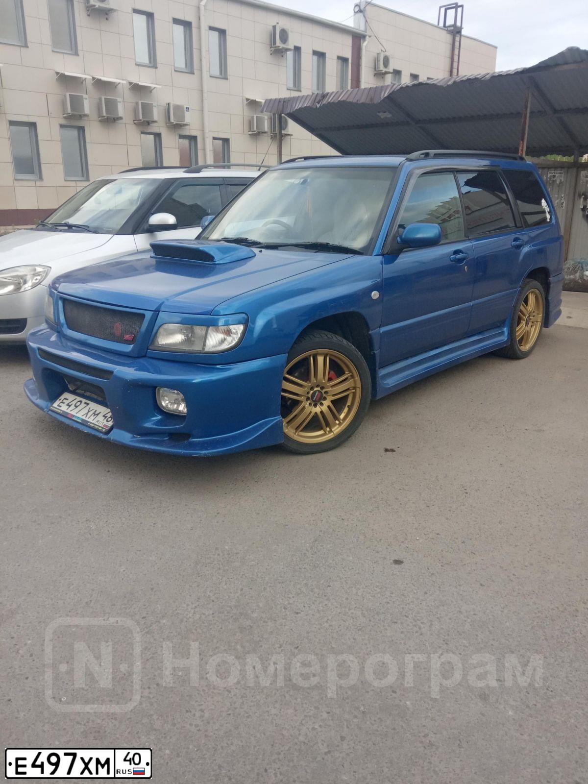 Фото автомобиля FORD FOCUS, 2003 — госномер Т792НС67. Цвет: Белый