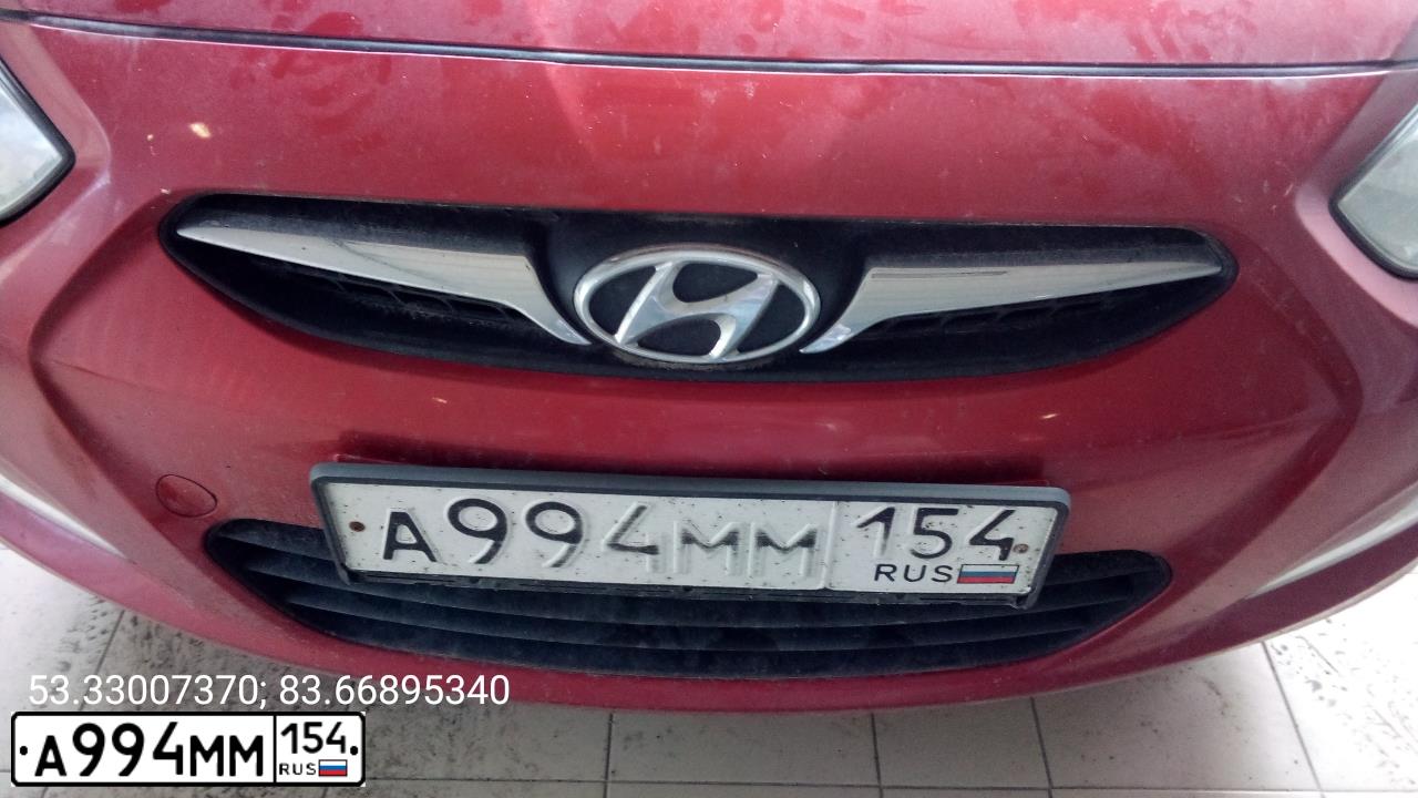 Фото автомобиля HYUNDAI SOLARIS, 2011 — госномер А994ММ154. Цвет: КРАСНЫЙ ГРАНАТ