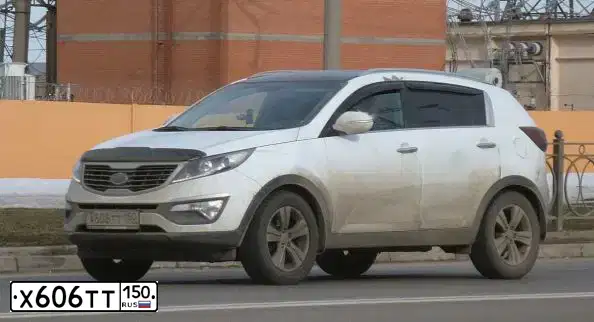 Фото автомобиля KIA CARNIVAL, 2021 — госномер Х606ТТ150. Цвет: ЧЕРНЫЙ