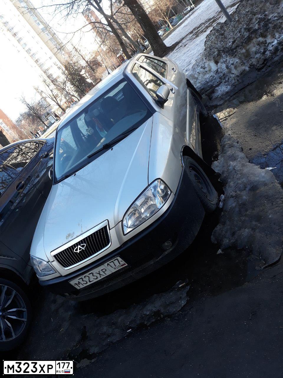 Фото автомобиля CHERY AMULET /FLAGCLOUD/, 2007 — госномер М323ХР177. Цвет: СЕРЫЙ