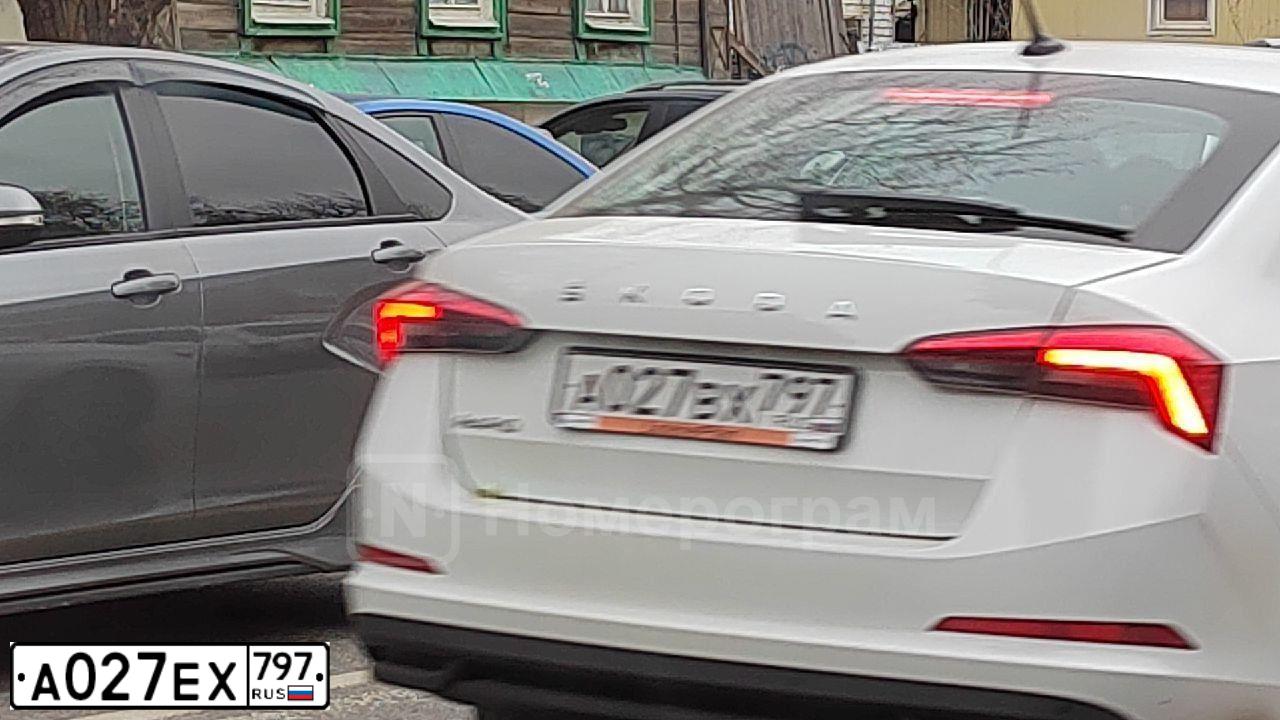 Фото автомобиля KIA RIO, 2021 — госномер Р411НН797. Цвет: ЧЕРНЫЙ