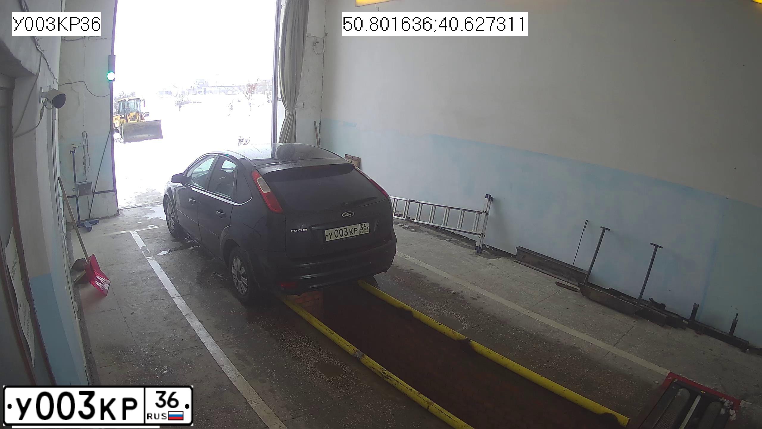 Фото автомобиля FORD FOCUS, 2007 — госномер У003КР36. Цвет: ЧЕРНЫЙ