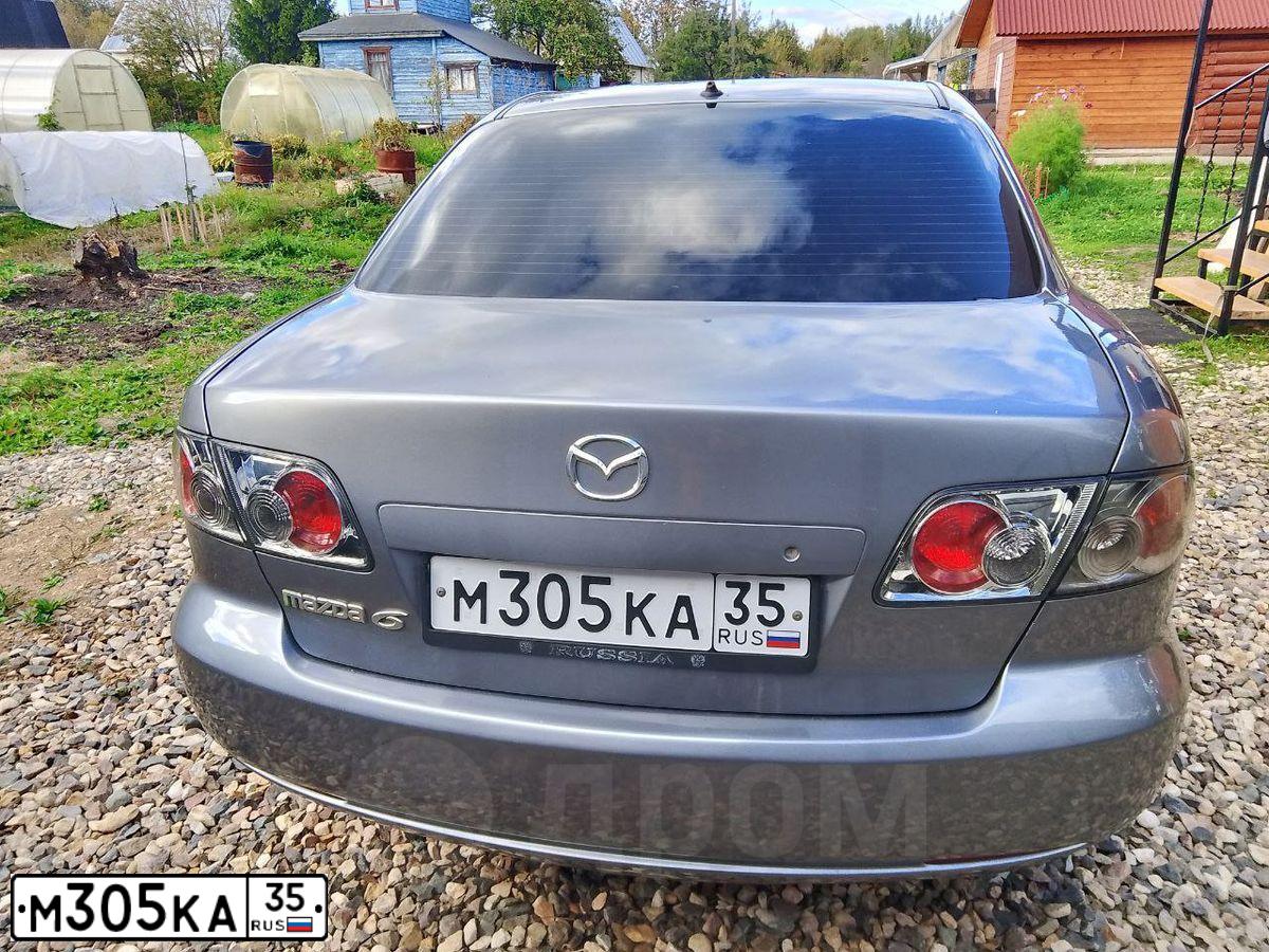 Фото автомобиля MAZDA A 6, 2006 — госномер М305КА35. Цвет: СЕРЫЙ