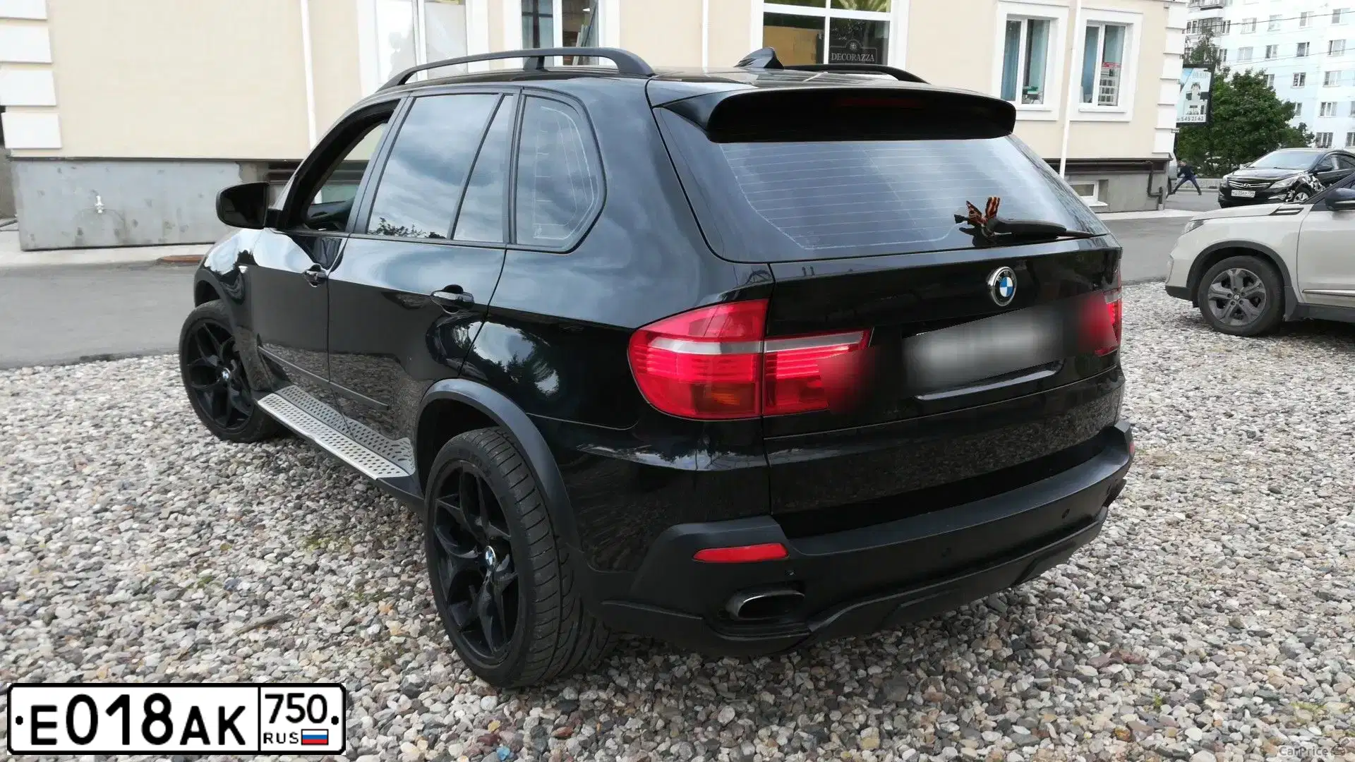 Фото автомобиля BMW X5, 2009 — госномер Е018АК750. Цвет: ЧЕРНЫЙ