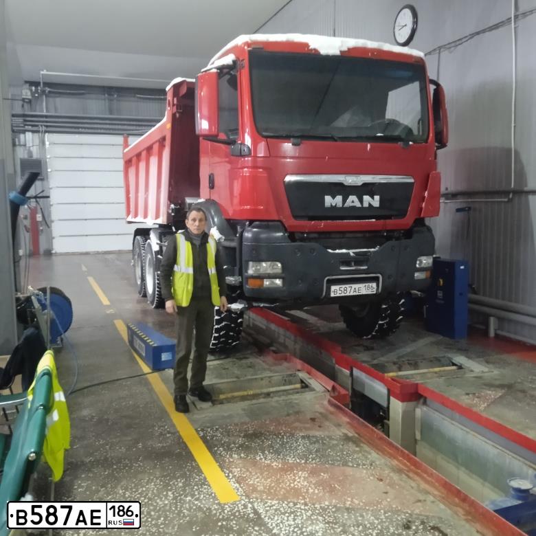 Фото автомобиля MAN TGS 40.XXX /6X6/, 2013 — госномер Р009ТХ72. Цвет: КРАСНЫЙ