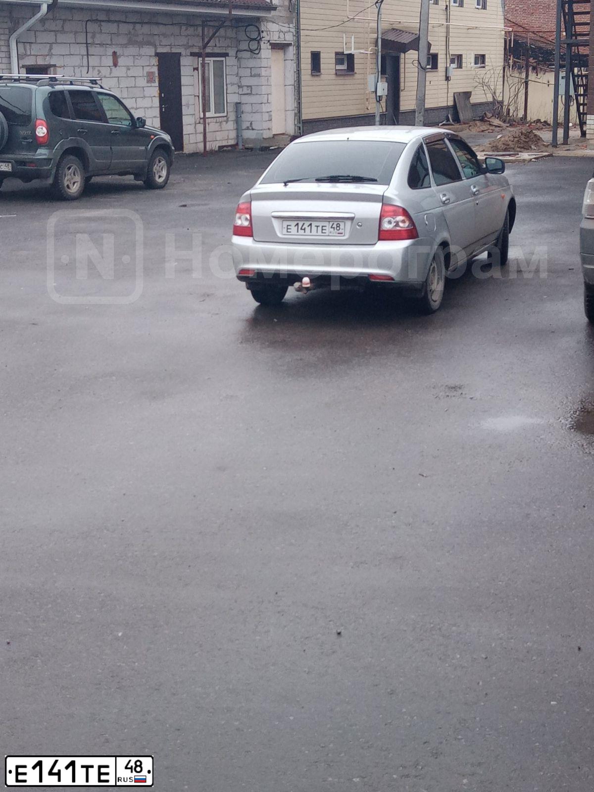 Фото автомобиля LADA 2172 PRIORA, 2014 — госномер Е141ТЕ48. Цвет: СВ.СЕРЕБ.МЕТАЛЛ