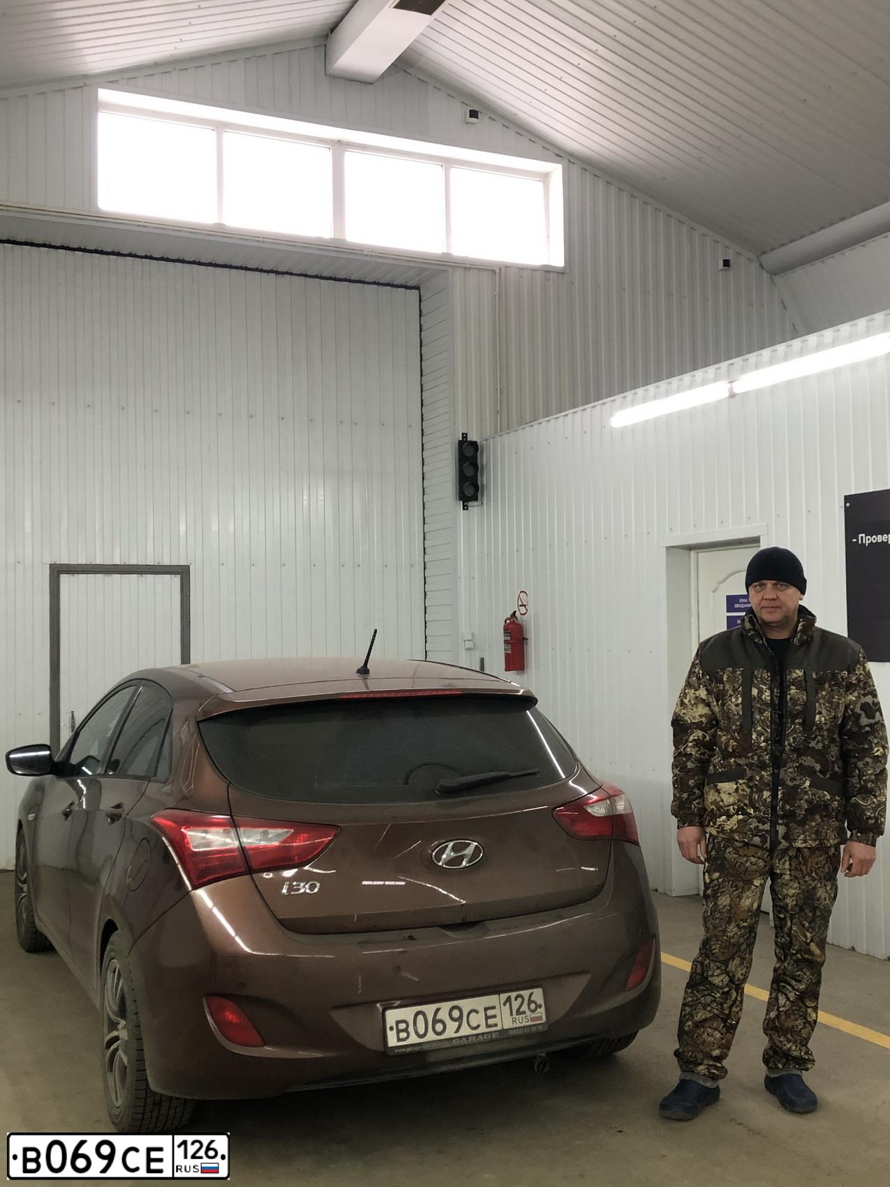 Фото автомобиля HYUNDAI I30, 2012 — госномер В069СЕ126. Цвет: Коричневый